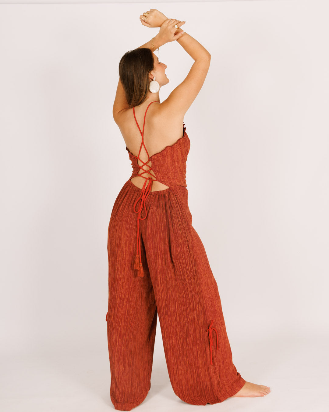 red sequined jumpsuit with long pants